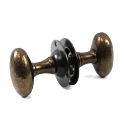 Hammered Oval Door Knobs - Antique Brass