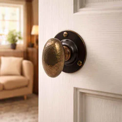 Hammered Oval Door Knobs - Antique Brass