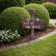 Keep off the grass sign worm spike
