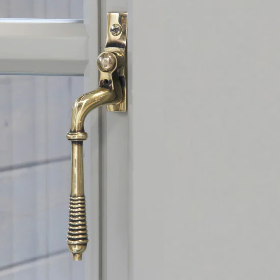 Reeded Espagnolette Casement Fastener - Aged Brass