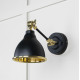 Smooth Brass Brindley Wall Light in Elan Black