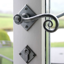 Blacksmith Pewter Patina Monkeytail Lever Door Handle on Diamond Rosette