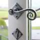 Blacksmith Pewter Patina Monkeytail Lever Door Handle on Diamond Rosette