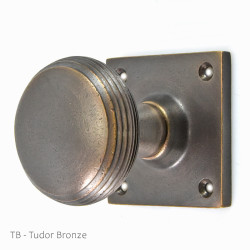 Reeded Cushion Door Knob on a Square Rose