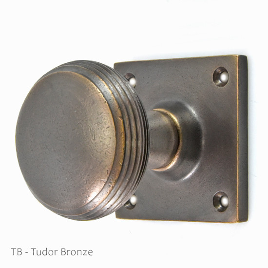 Reeded Cushion Door Knob on a Square Rose