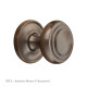 Stepped Cushion Door Knob on Raised Edge Covered Rose