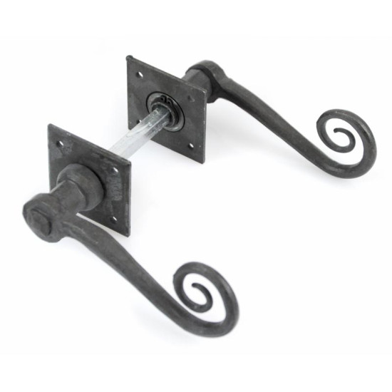 Blacksmith Beeswax Monkeytail Lever Door Handle on Diamond Rosette