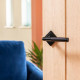Traditional Blacksmith Brompton Lever Door Handle on Square Rose Set - Sprung