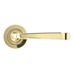 Avon Sprung Lever Door Handle on Round Rose Set - Aged Brass