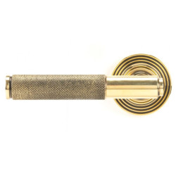 Brompton Sprung Lever Door Handle on Beehive Rose Set - Aged Brass