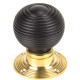 Cottage Ebony Knob Set with Polished Brass Roses