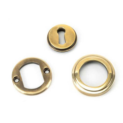 Aged Brass Art Deco Round Escutcheon