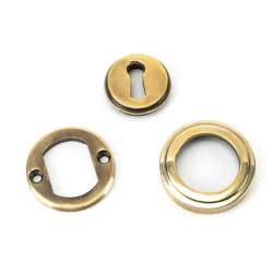 Aged Brass Art Deco Round Escutcheon