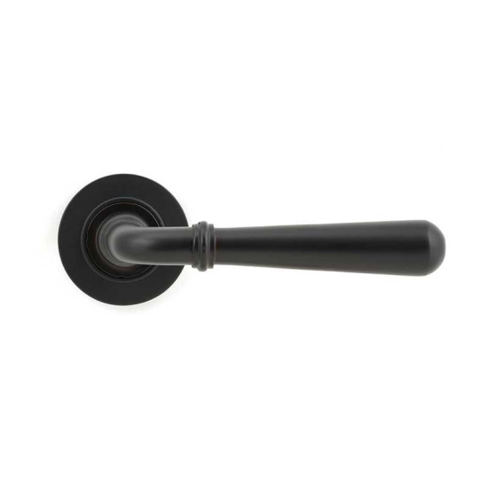 Aged Bronze Newbury lever handle on a round rose, unsprung — tapered traditional profile in a dark aged bronze finish