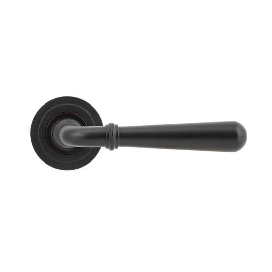 Aged bronze Newbury lever with tapered handle on a circular Art Deco rose — single lever shown