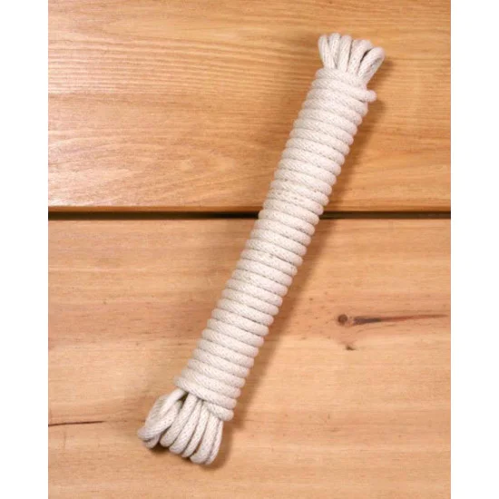 Neatly coiled natural-coloured rope (10 metre length, 5mm diameter) shown on a wooden surface for a Kitchen Maid® clothes airer