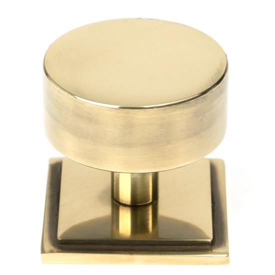 Aged Brass Kelso Cabinet Knob on Square Rose