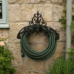 Cast Iron Fleur De Lys Hose Tidy