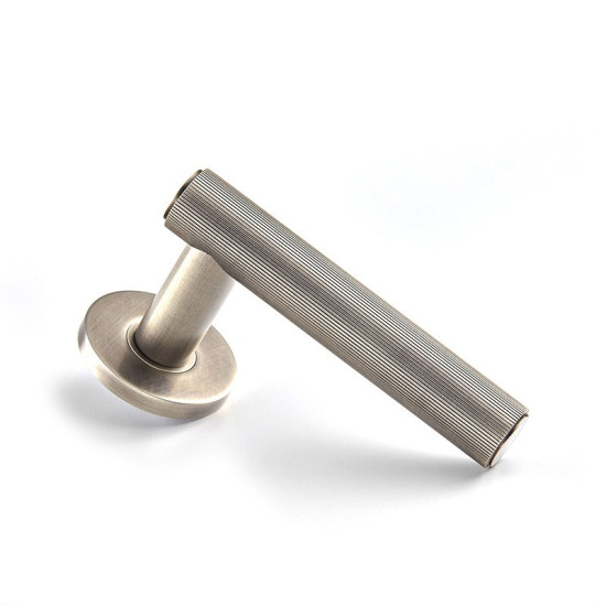 Sigma Lever Door Handle on a Covered Rose