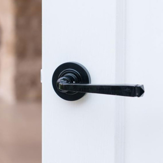 Traditional Blacksmith Avon Lever Door Handle on Round Rose Set - Sprung