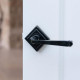 Traditional Blacksmith Avon Lever Door Handle on Square Rose Set - Sprung