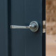 Blacksmith Pewter Patina Avon Lever Door Handle on Round Rose Set - Sprung