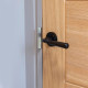 Traditional Blacksmith Hammered Newbury Lever Door Handle on Art Deco Rose Set - Sprung