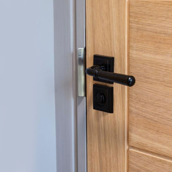 Traditional Blacksmith Hammered Newbury Lever Door Handle on Square Rose Set - Sprung