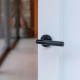 Traditional Blacksmith Brompton Lever Door Handle on Beehive Rose Set - Sprung