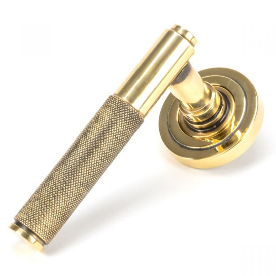 Brompton Sprung Lever Door Handle on Art Deco Rose Set - Aged Brass