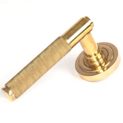 Brompton Sprung Lever Door Handle on Art Deco Rose Set - Polished Brass