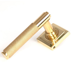 Brompton Sprung Lever Door Handle on Square Rose Set - Polished Brass