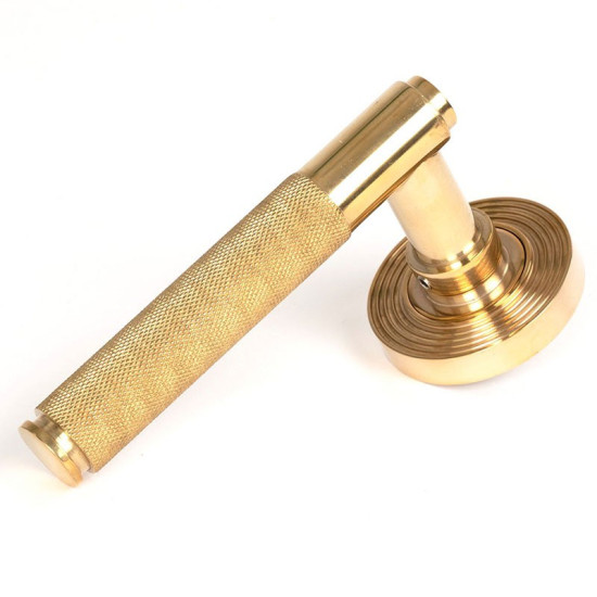 Brompton Unsprung Lever Door Handle on Beehive Rose Set - Polished Brass