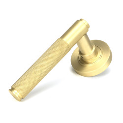 Satin Brass Brompton Lever Door Handle on Round Rose Set - Unsprung