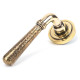 Hammered Newbury Lever on Art Deco Rose Set - Aged Brass