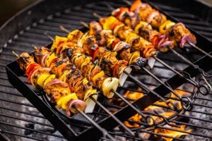 Cooking skewers on a Kadai fire bowl